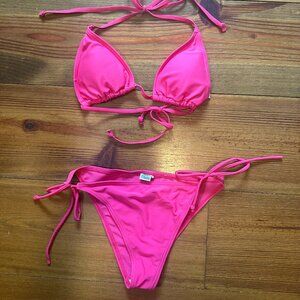 Neon pink Bikini. Tied top and bottoms. Removable Pads.
